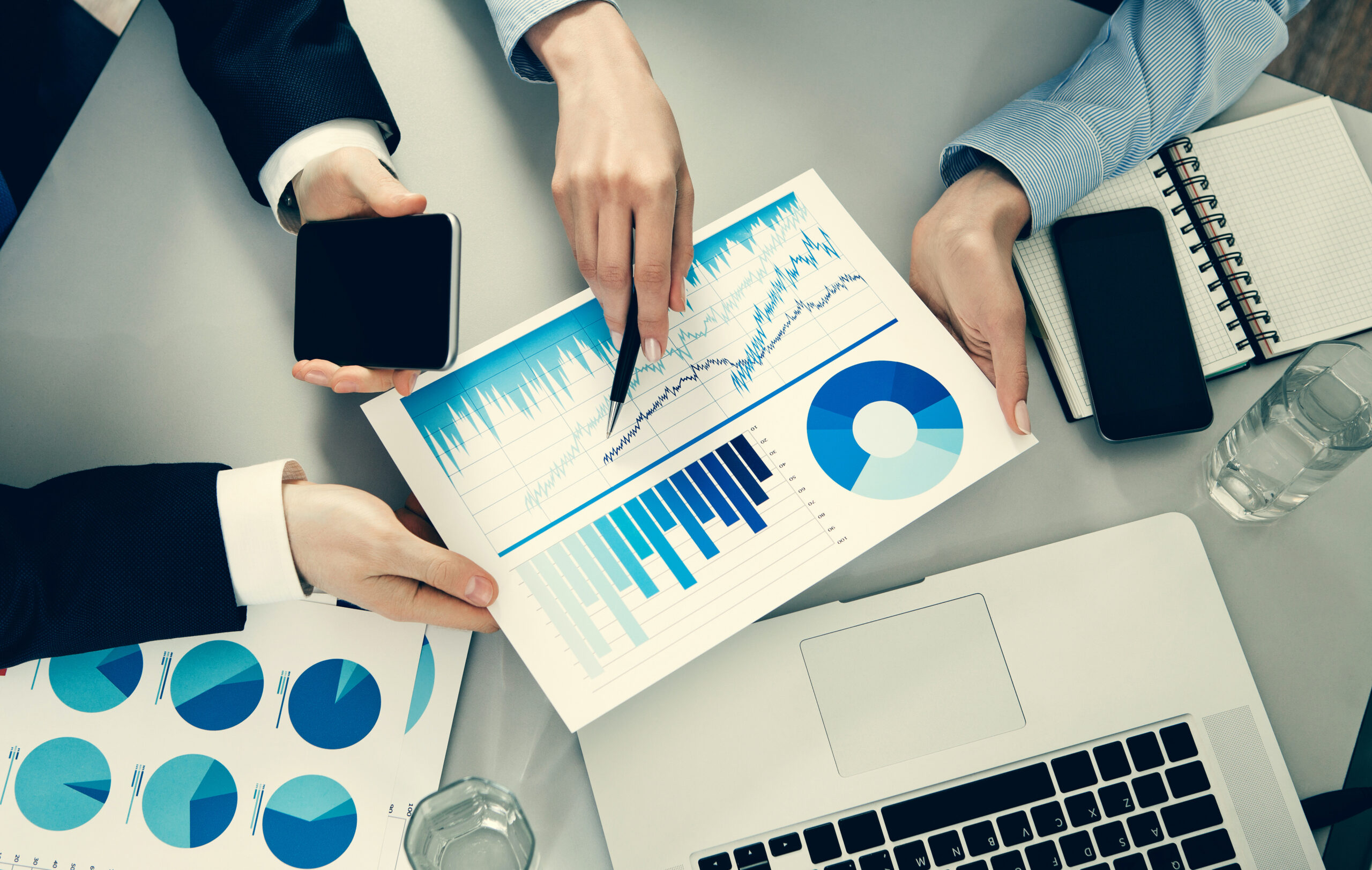 Businessman and businesswoman working in office