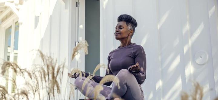 Photo of a woman doing yoga outside